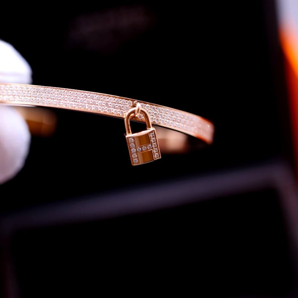 HERMES CUFF BRAC W/ DANGLING CHARM